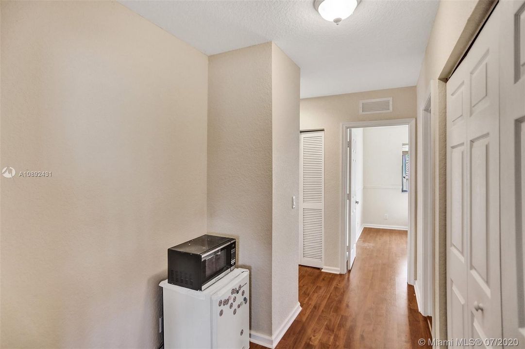 Hallway outside of third bedroom. Nook for desk area.