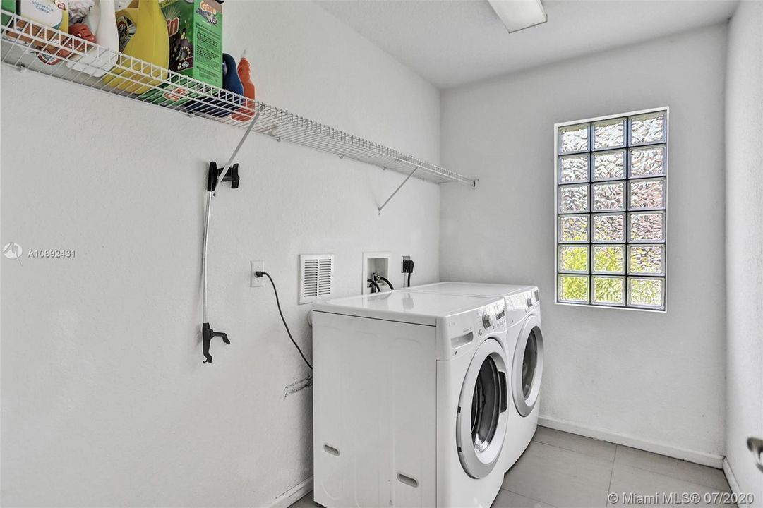 Large laundry room on main level.