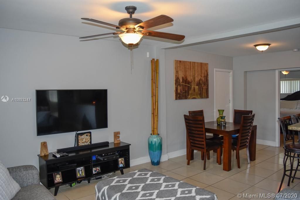 ENJOY WATCHING TV IN THE FAMILY ROOM OR WHILE YOU ARE COOKING OR DINING
