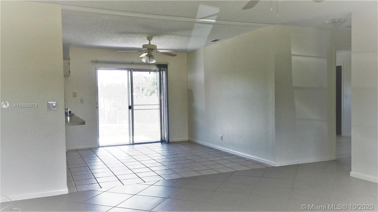 Lots of light! Large dining area. Ceiling fans in dining area and living room.