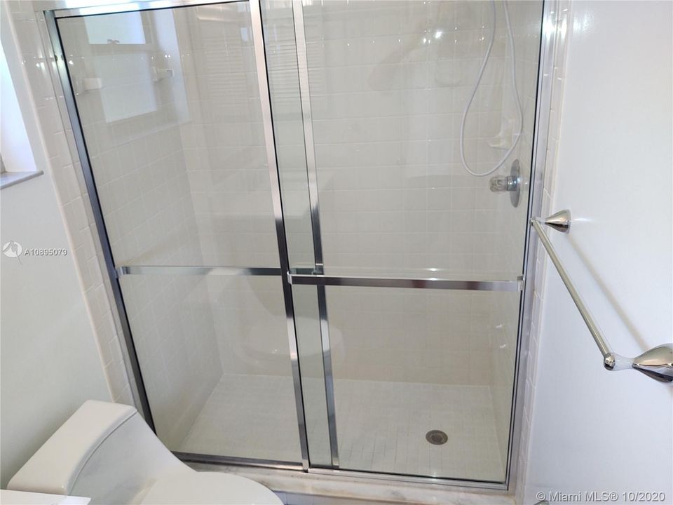 Sparkling clean shower in master bath.