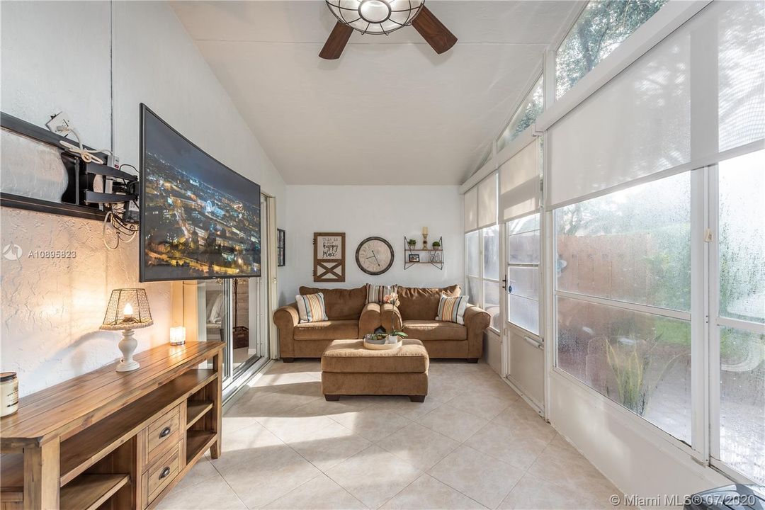 Enclosed Florida Room with new custom shades for privacy