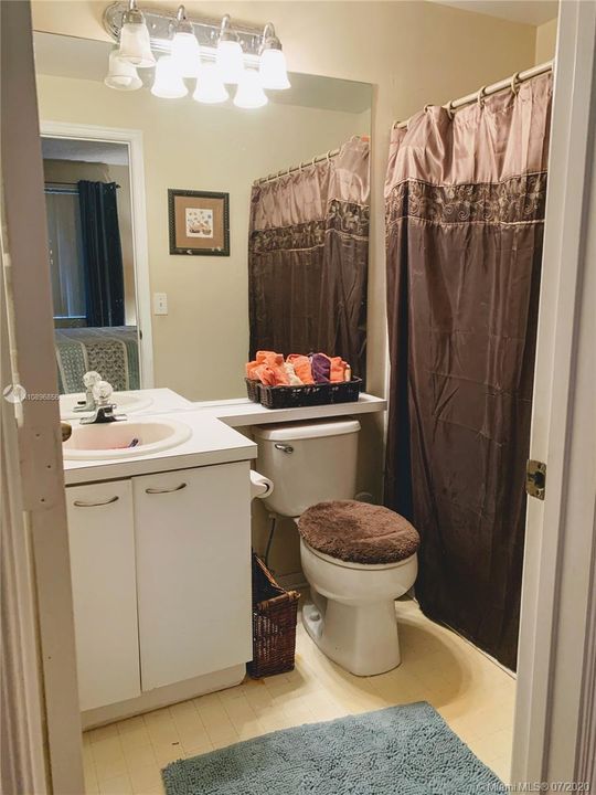 One of the master with tub shower