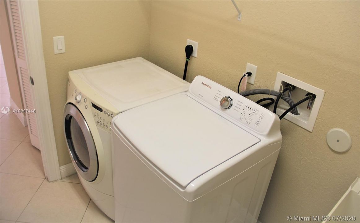 21 Laundry room next to downstairs bathroom