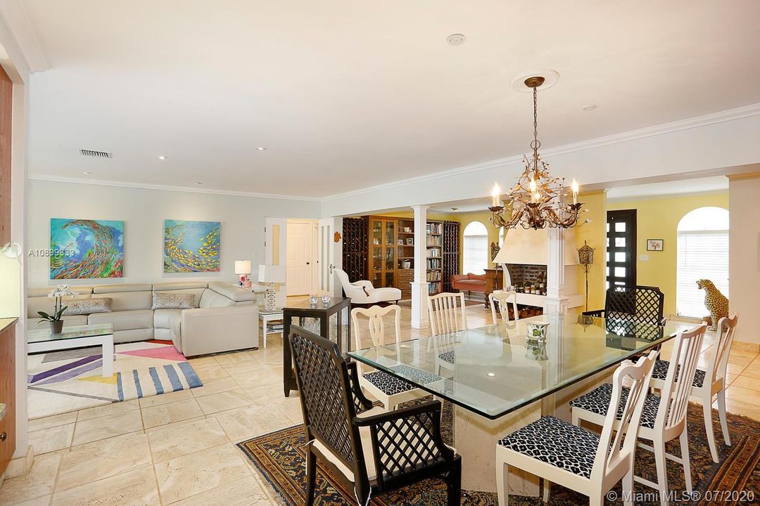 Dining area, front entrance door foyer on the right, the living room on the left.