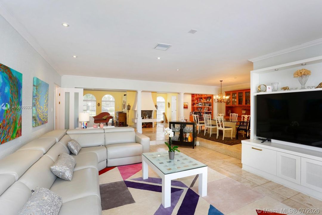 Living area. Double doors to the pool patio off of this room.