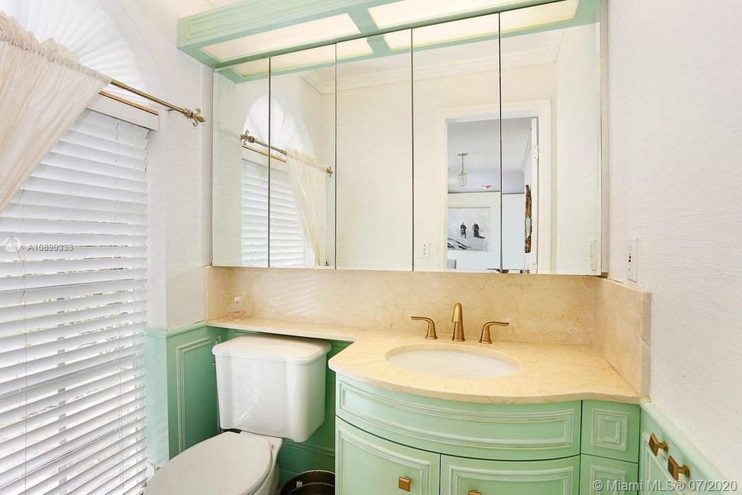 This powder room is located in the front of the home.