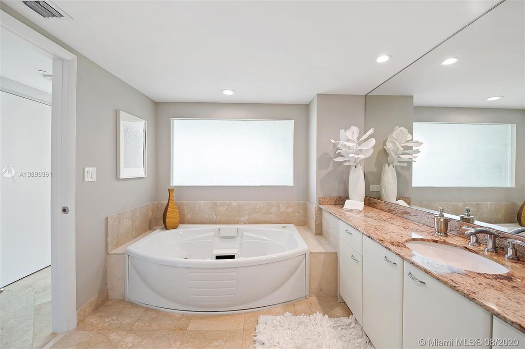 Spacious dual master bathroom