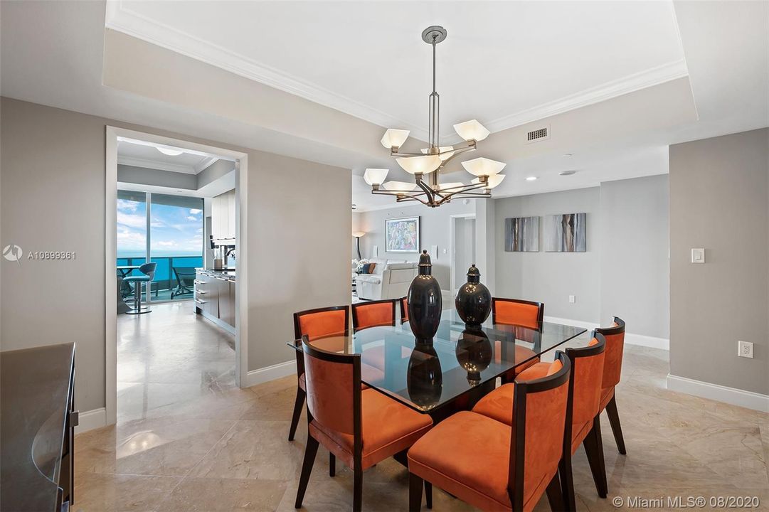 Formal dining room with access to the kitchen and living room