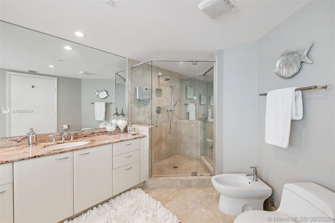 Master bathroom with jacuzzi tub and separate shower