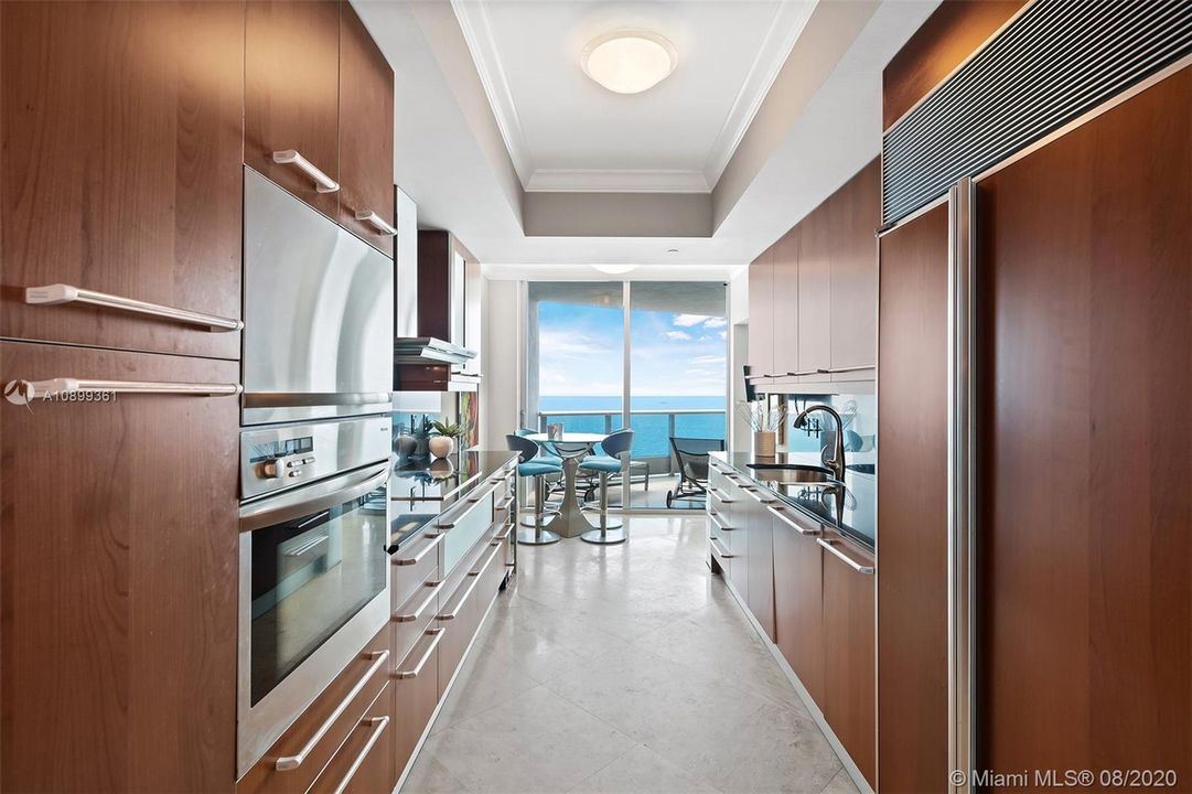 Snaidero Kitchen with Miele appliances. Oceanfront eat in kitchen.