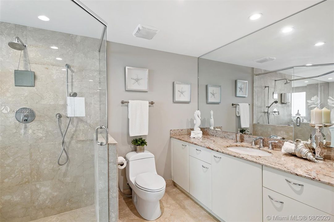 Master bathroom with jacuzzi tub and separate shower