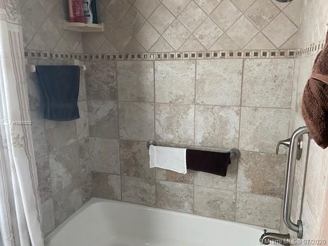 Upgraded Guest Bathroom with New Wall Tile