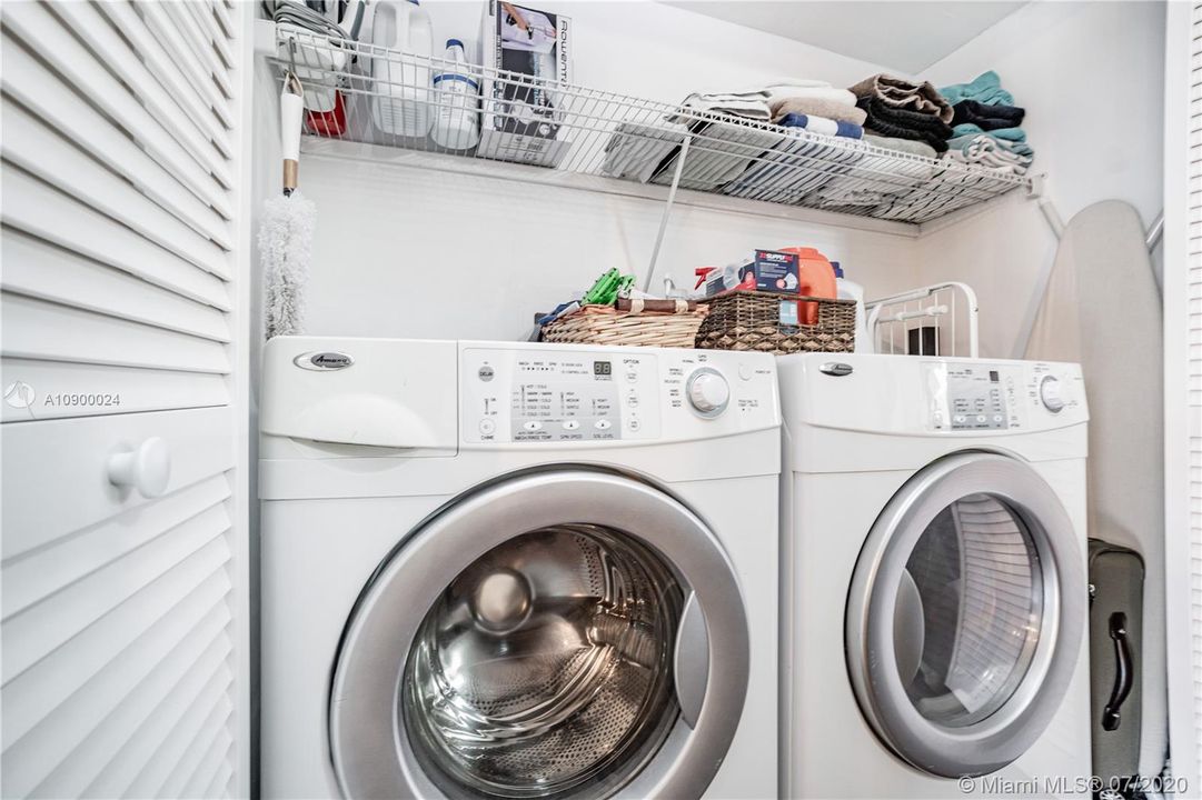 Washer/Dryer inside unit.