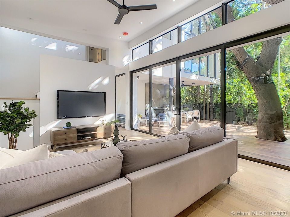 TV-FAMILY ROOM WITH A COURT VIEW