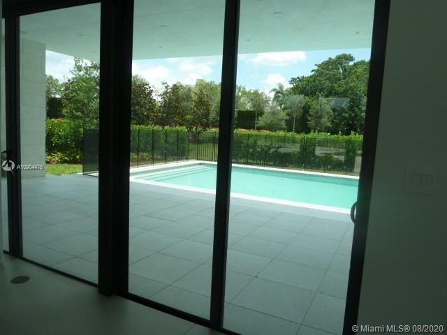 ALL AROUNG THE HOUSE ARE IMPACT DOORS AND WINDOWS.