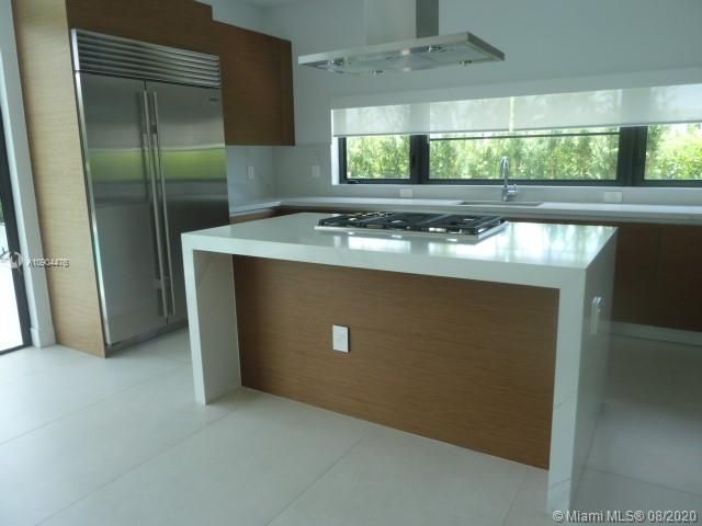 KITCHEN GAS STOVE, SUBZERO SS FRIDGE THE ISLAND IS UPGRADED WITH 3CM CATACATA QUARTZ