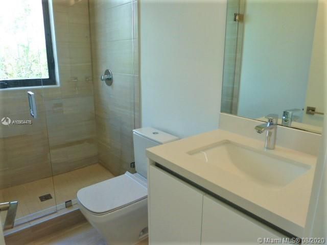 ALL SECONDARY BATHS WITH THE SAME UPGRADES GLOOSY CABINETS WITH TOILET PORCELAINE AND FRAMELESS SHOWER DOOR .