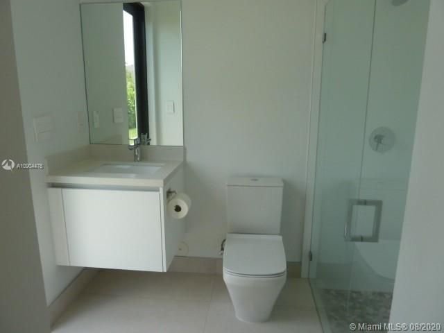 ALL BATH ROOMS HAVE BEEN UPGRADE GLOSS CABINETS, DURAVIT TANK, HANDHELD SHOWER HEAD AND FRAMELESS SHOWER DOORS