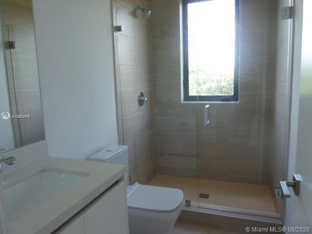 ALL SECONDARY BATHS WITH THE SAME UPGRADES GLOOSY CABINETS WITH TOILET PORCELAINE AND FRAMELESS SHOWER DOOR .