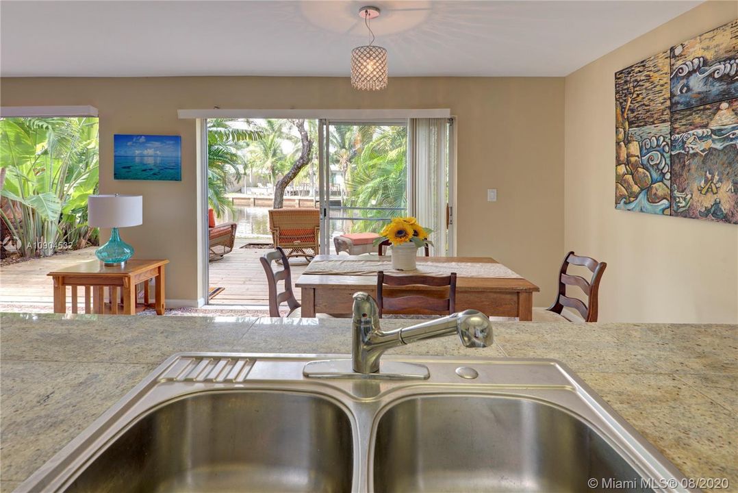 OVERLOOKING DINING AREA INTO PATIO