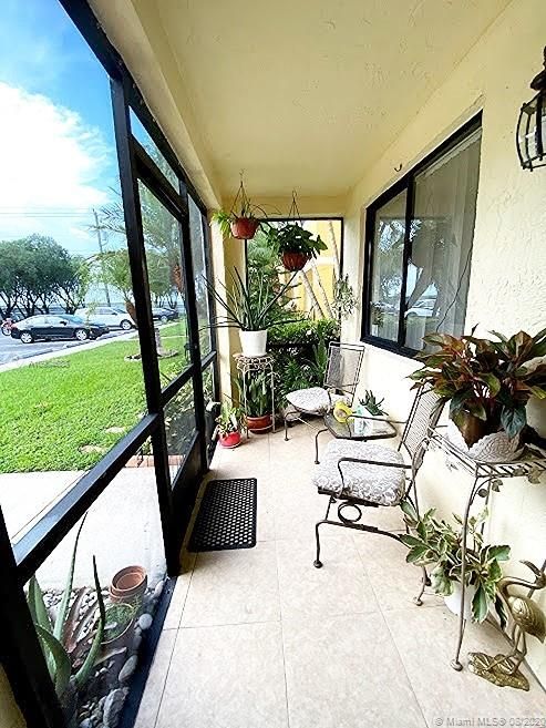 Front porch entry with sitting area