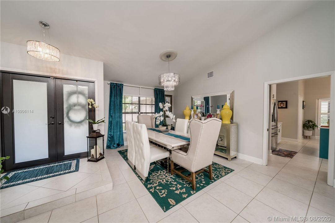 Front Entry with New Impact Doors, Formal Dining Room.