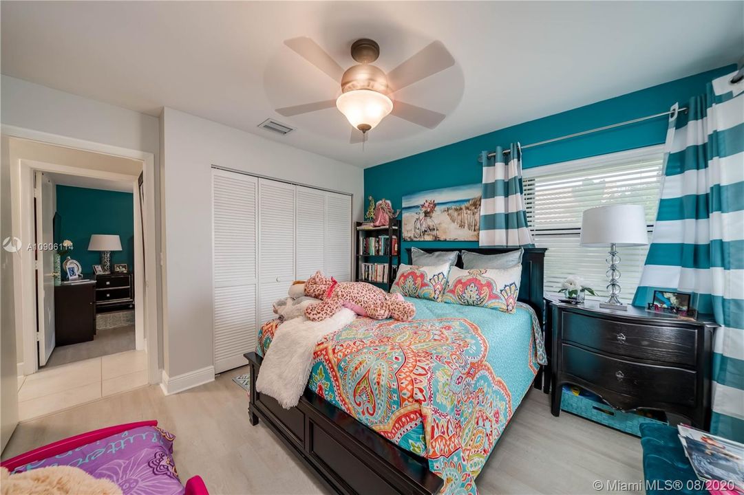3rd guest bedroom, new wood flooring and ceiling fan