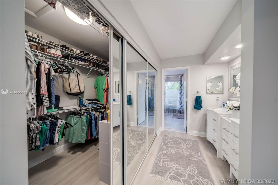 Walk-In Closet in Master Bedroom - Built in Custom drawers adjacent