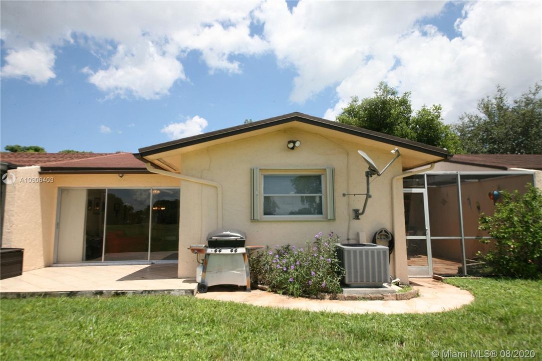 Back of home showing both patios.