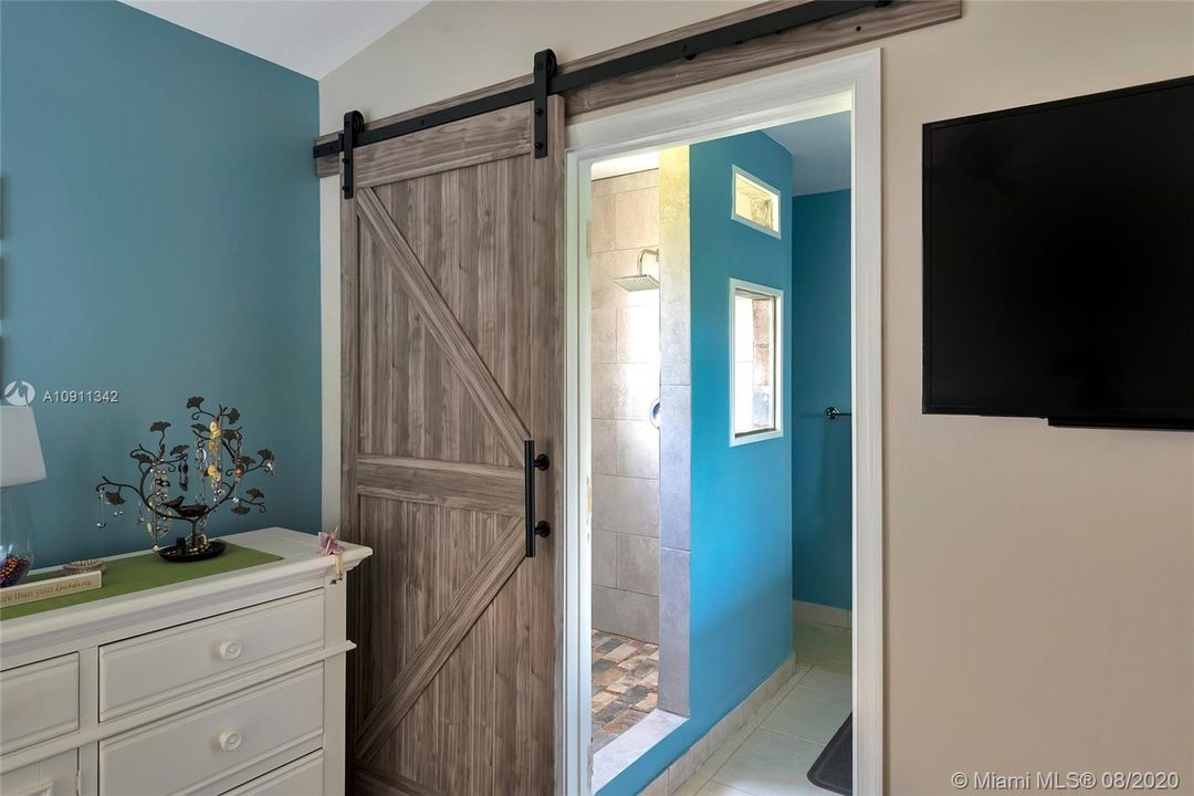 Master Bedroom leading to master bathroom