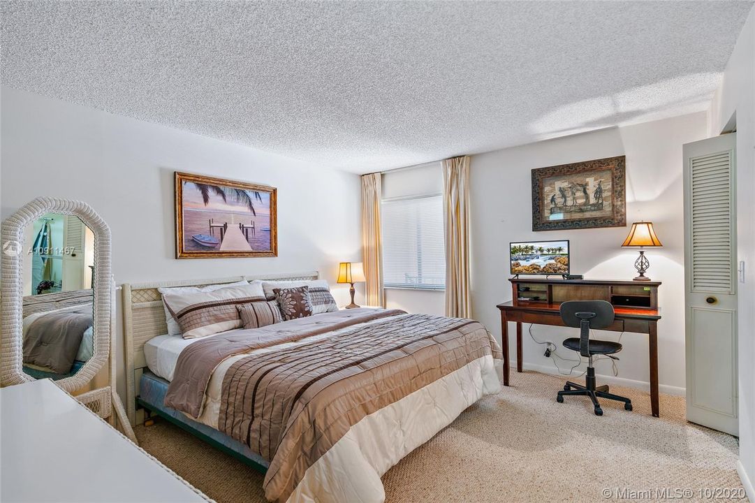 Master bedroom with a closet and a walk in closet and private full bath.