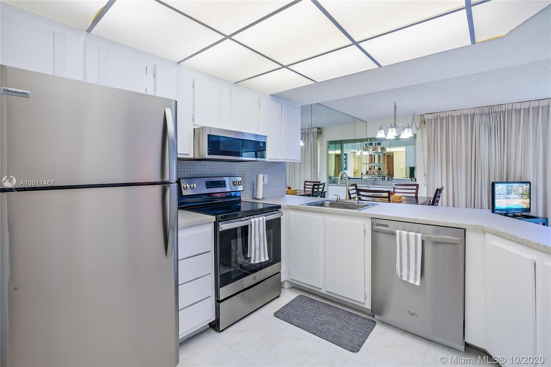 Refinished kitchen with brand new refrigerator, range and microwave. Newer dishwasher-2017.