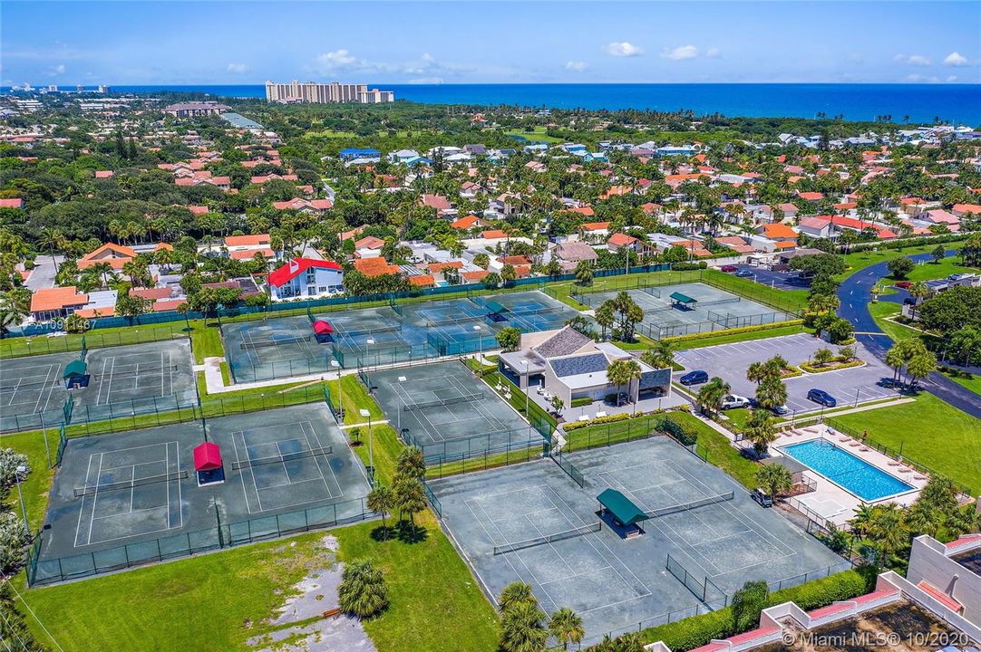 Tennis courts and one of two community pools.
