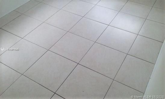 WHITE TILE FLOORS THROUGHOUT