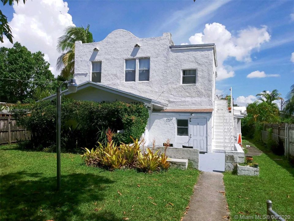 QUIET BUILDING with NICE GRASS LAWN IN FRONT