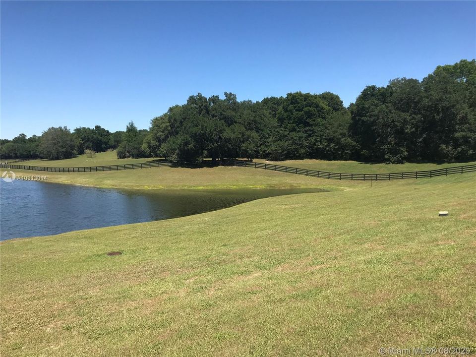 Rolling hills an endless fence and a relaxing lake
