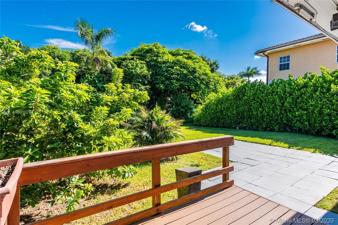 Fenced yard with BBQ deck and large PATIO