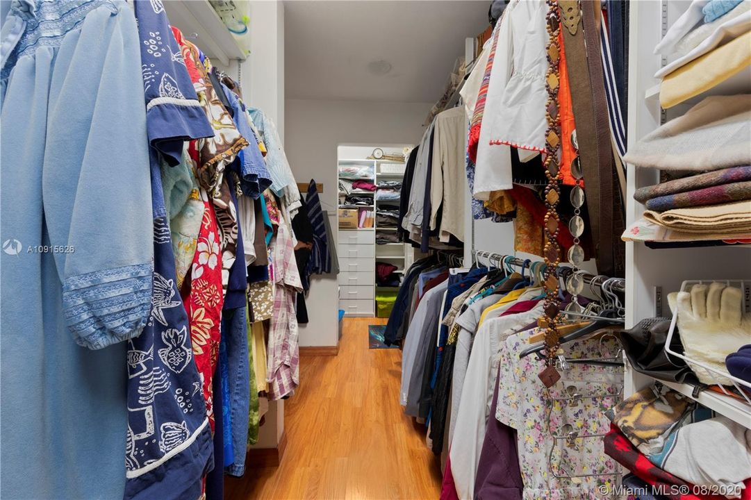 HUGE MASTER WRAP AROUND CLOSET W/ BUILT INS