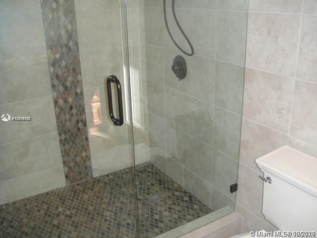 PRIMARY BATH/SHOWER W/ SEAMLESS GLASS DOORS