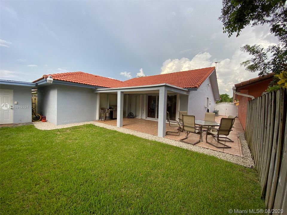 Full Backyard View! + Side Gated Driveway