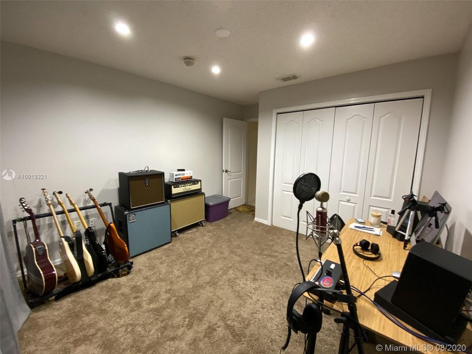 Bedroom 1 of 4. Carpet is new...There is tile underneath if the carpet is not preferred.