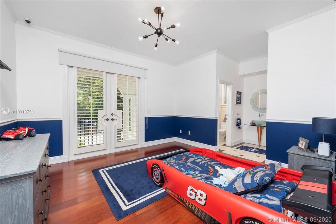 BEDROOM WITH BALCONY. SECOND FLOOR