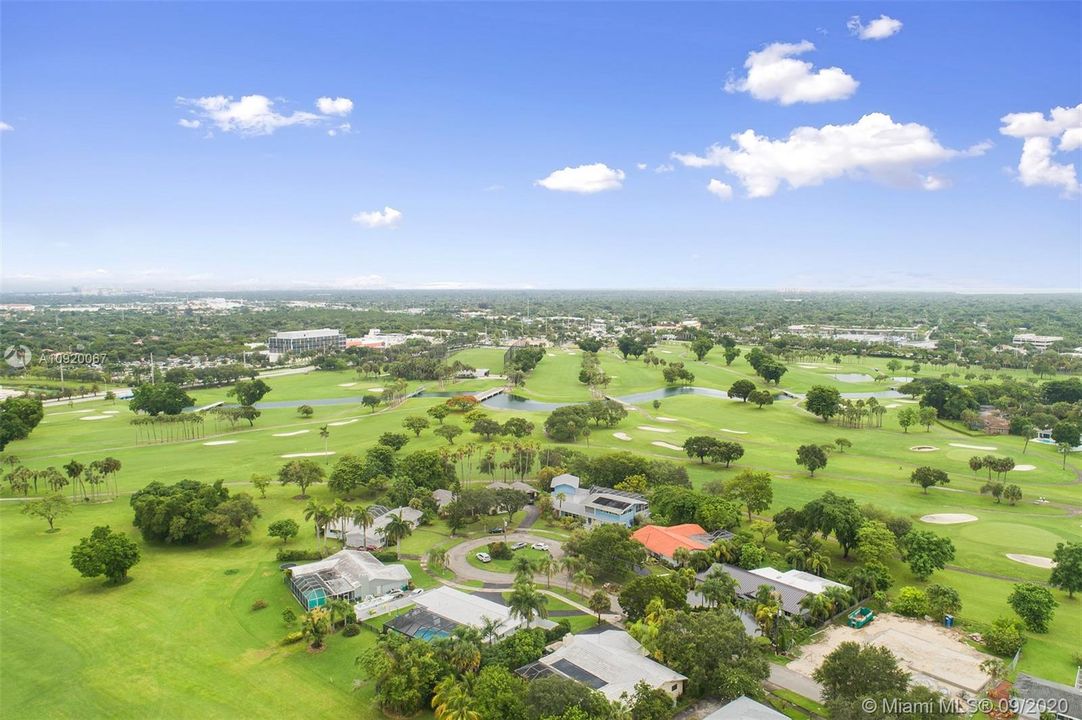 Drone view of golf course/cul de sac street