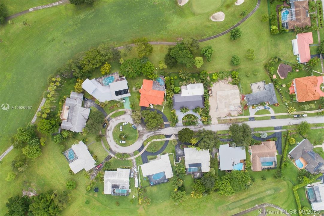 Drone view of cul de sac on golf course. Very quiet and private
