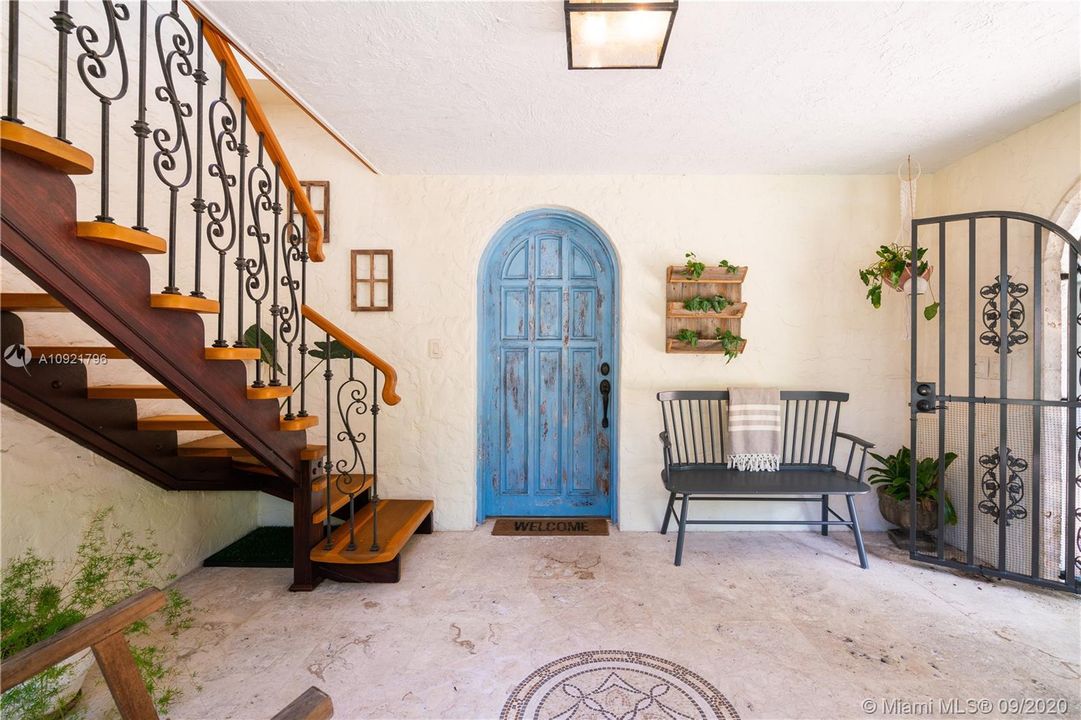 Romantic courtyard with timeless front door.