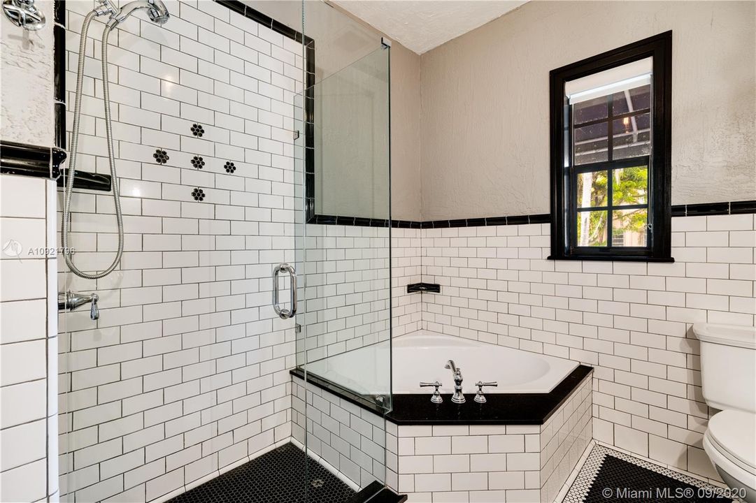 Guest bathroom with separate shower and tub
