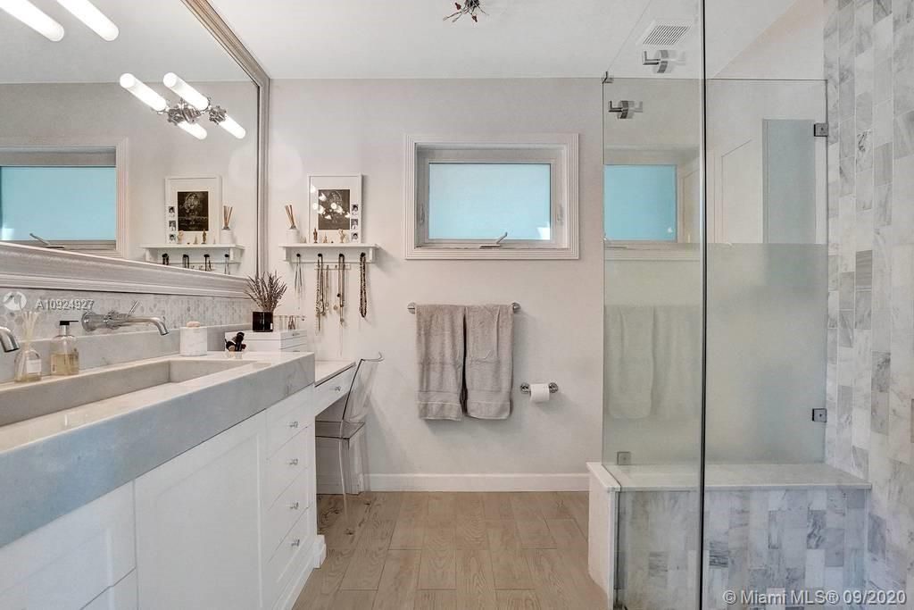 Master bath with sit down vanity