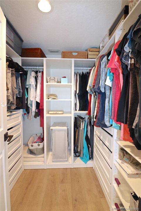 Maste suite closet with custom built ins