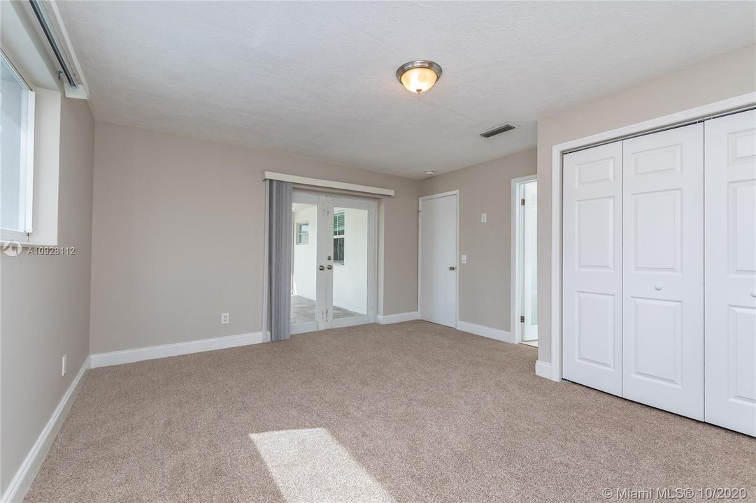 Master Bedroom with French doors to Covered Terrace